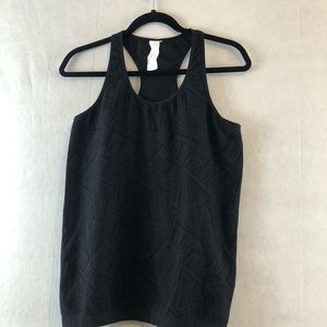 Fabletics Black Activewear Top large symmetric print racer back gently used